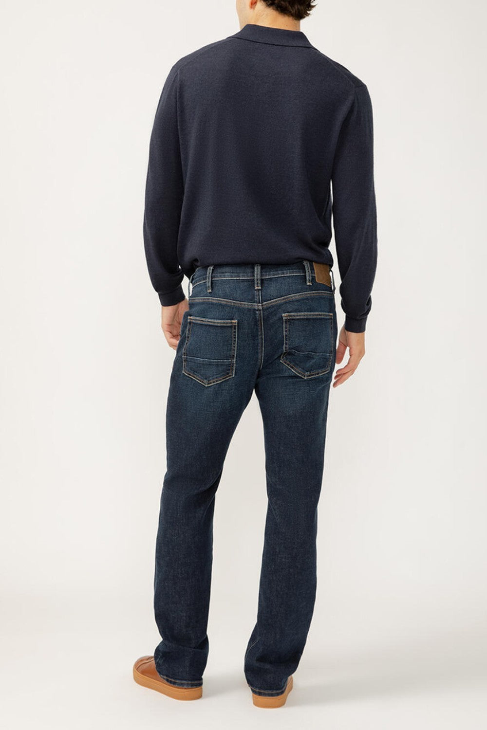 Jace offers a modern take on the classic cowboy jean. Now crafted with soft, durable Luxe Heritage denim, these jeans sit just below the waist and feature a slim fit through the hip and thigh. The bootcut leg opening balances the slim silhouette and easily fits over any footwear.