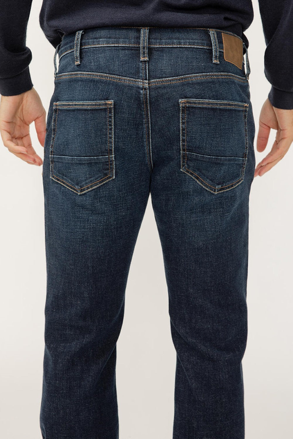 Jace offers a modern take on the classic cowboy jean. Now crafted with soft, durable Luxe Heritage denim, these jeans sit just below the waist and feature a slim fit through the hip and thigh. The bootcut leg opening balances the slim silhouette and easily fits over any footwear.