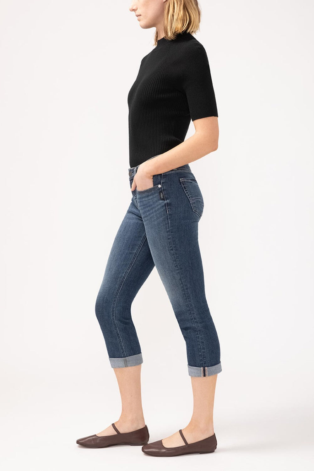 Suki is the best-selling Silver Jeans Co. curvy fit for good reason. Made with Luxe Stretch denim and designed to enhance curves, this fit creates a flattering silhouette with ease in the hip and thigh. The classic mid rise is comfortable, and the contoured waistband ensures a zero-gap fit.
