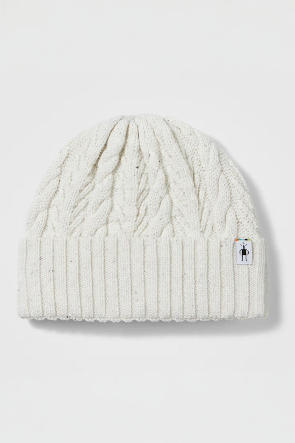 White cable knit beanie with a brand logo on a light gray background