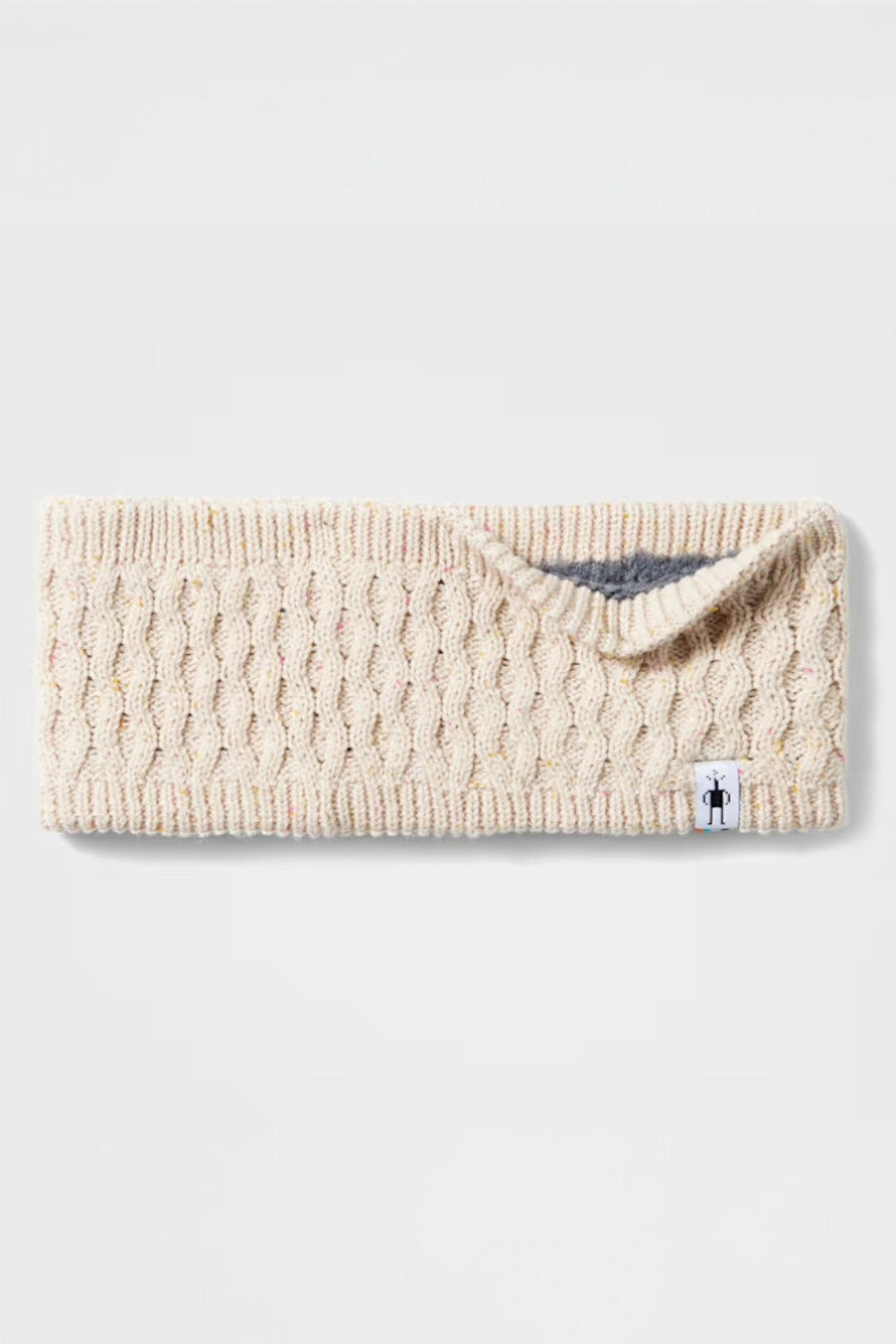 Beige knitted headband with a brand logo on a white background