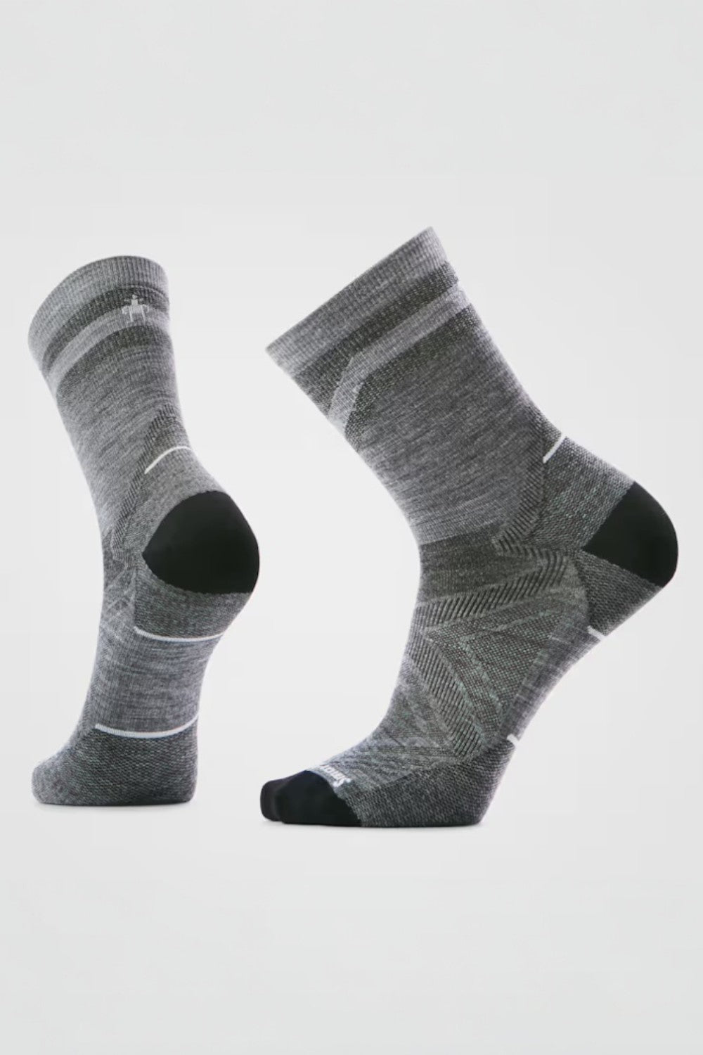 Pair of gray socks with black accents on a white background
