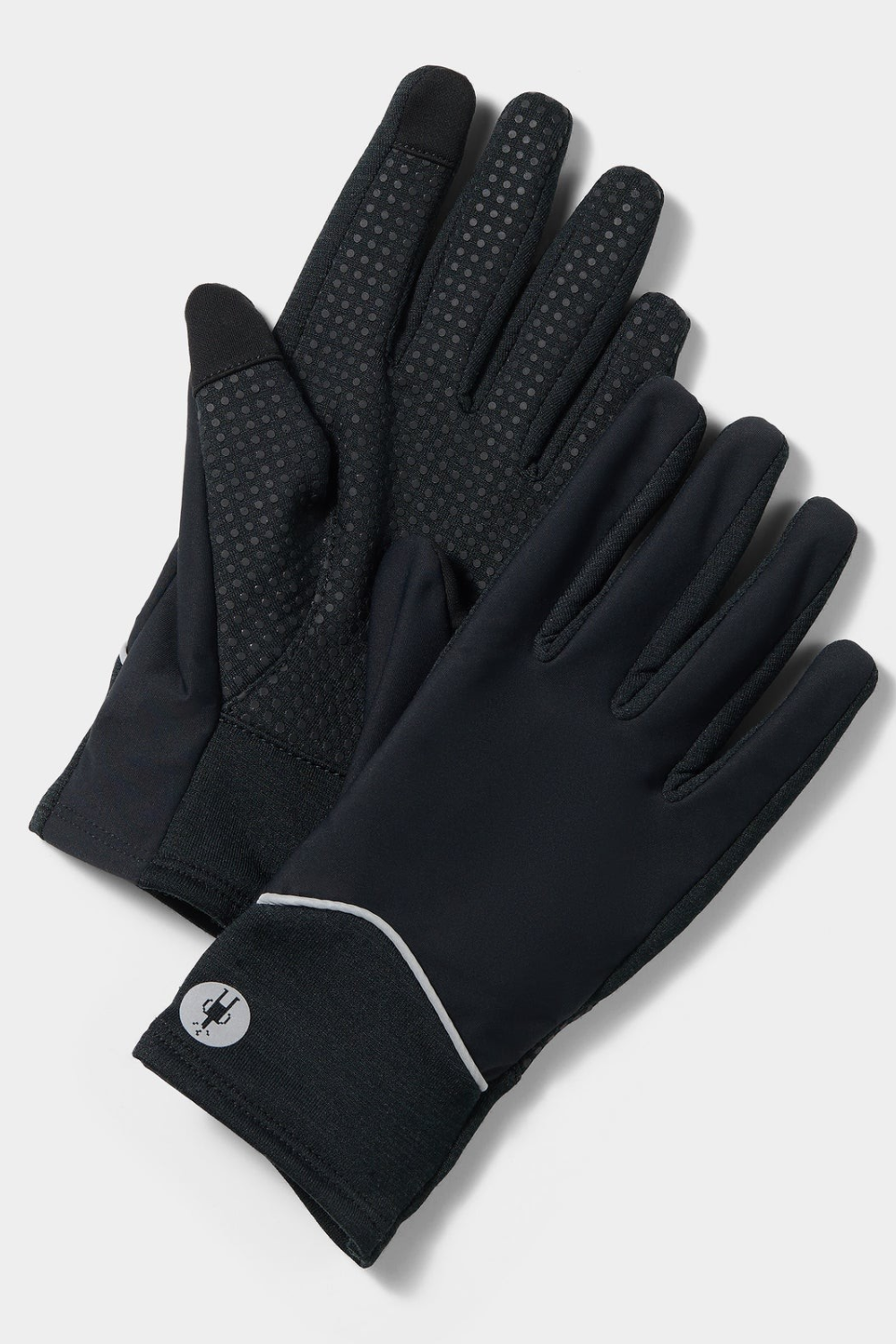 Black glove with reflective decoration and grip detail on the palm photographed on a light background.