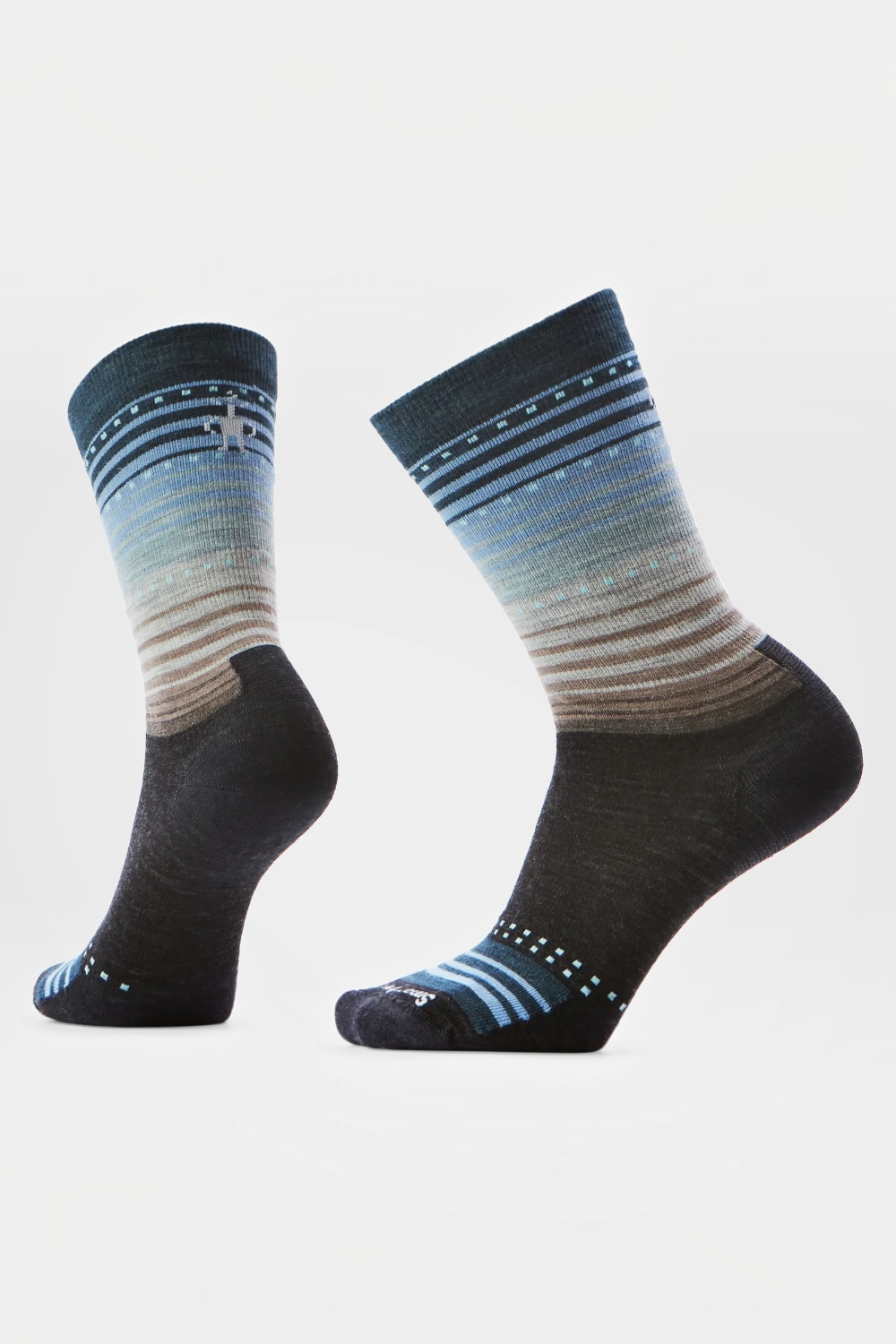 Crew length socks with a mostly black foot and tan, grey and blue stripes on a light background.