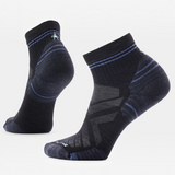 Pair of black and purple ankle socks on a white background