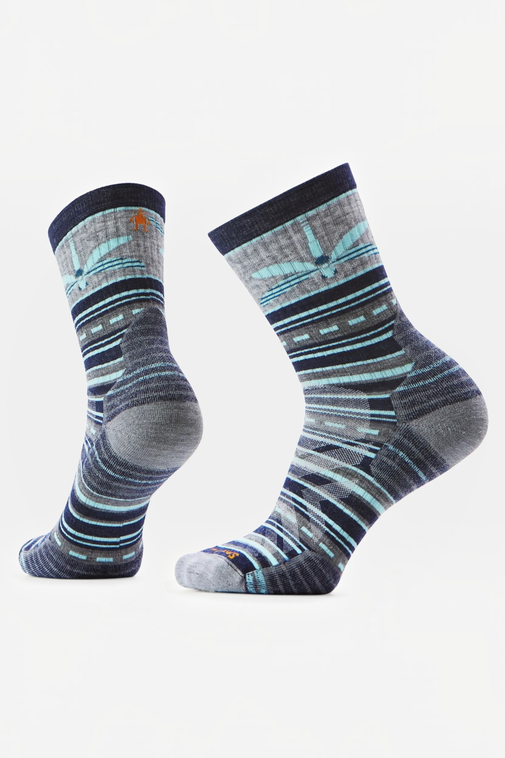 A pair of crew socks with a gray and navy striped pattern, featuring light blue dragonfly graphic and a small orange logo on the side, displayed against a plain white background.