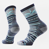 A pair of crew socks with a gray and navy striped pattern, featuring light blue dragonfly graphic and a small orange logo on the side, displayed against a plain white background.