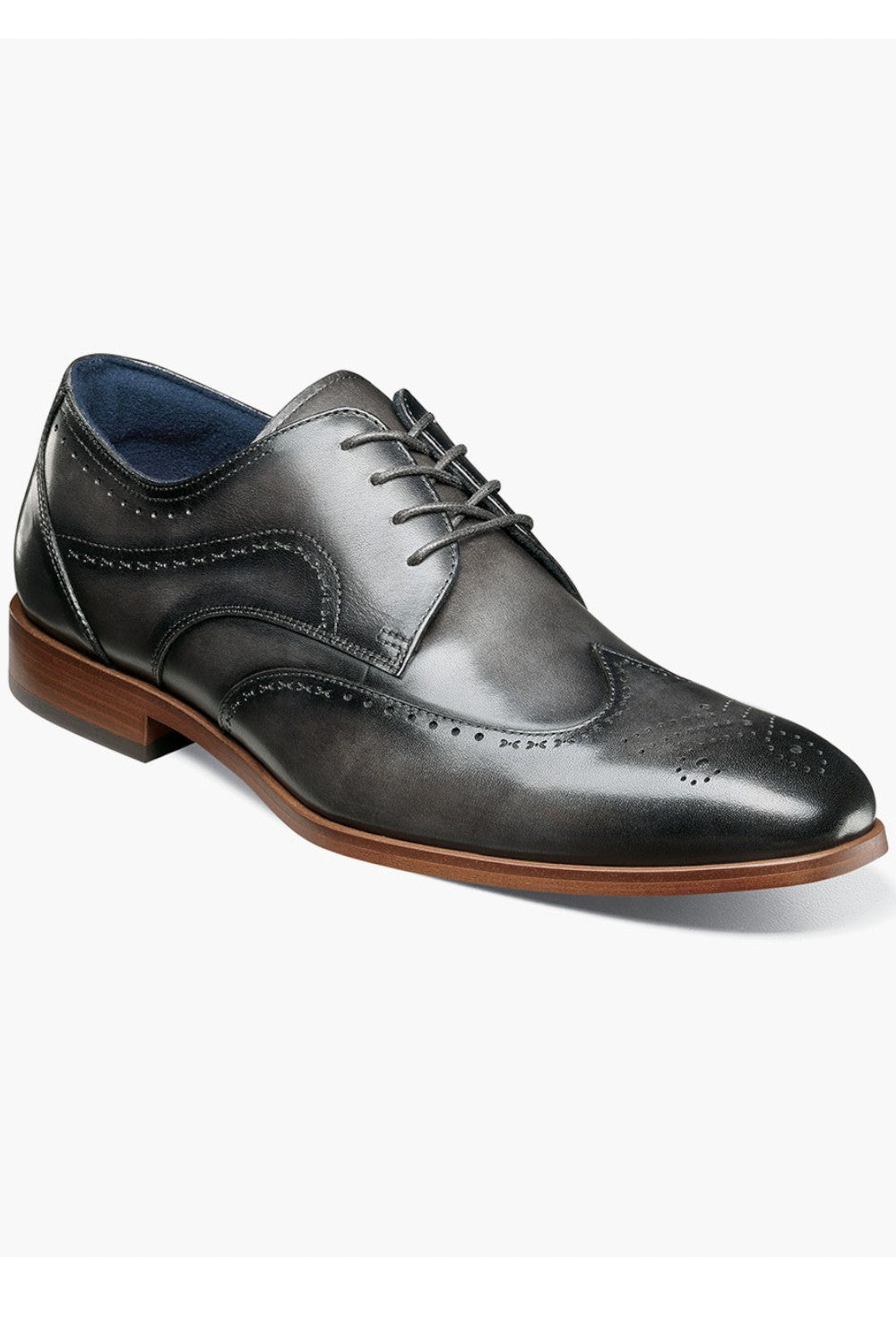 Sleek and modern, the Stacy Adams Brayden Wingtip Oxford is a classic style every man should have in his collection. With the versatility to wear with everything from your best suit to your favorite jeans, it also features the comfort of our cushioned FlexZone footbed.