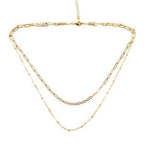 Gold chain necklace on a white background