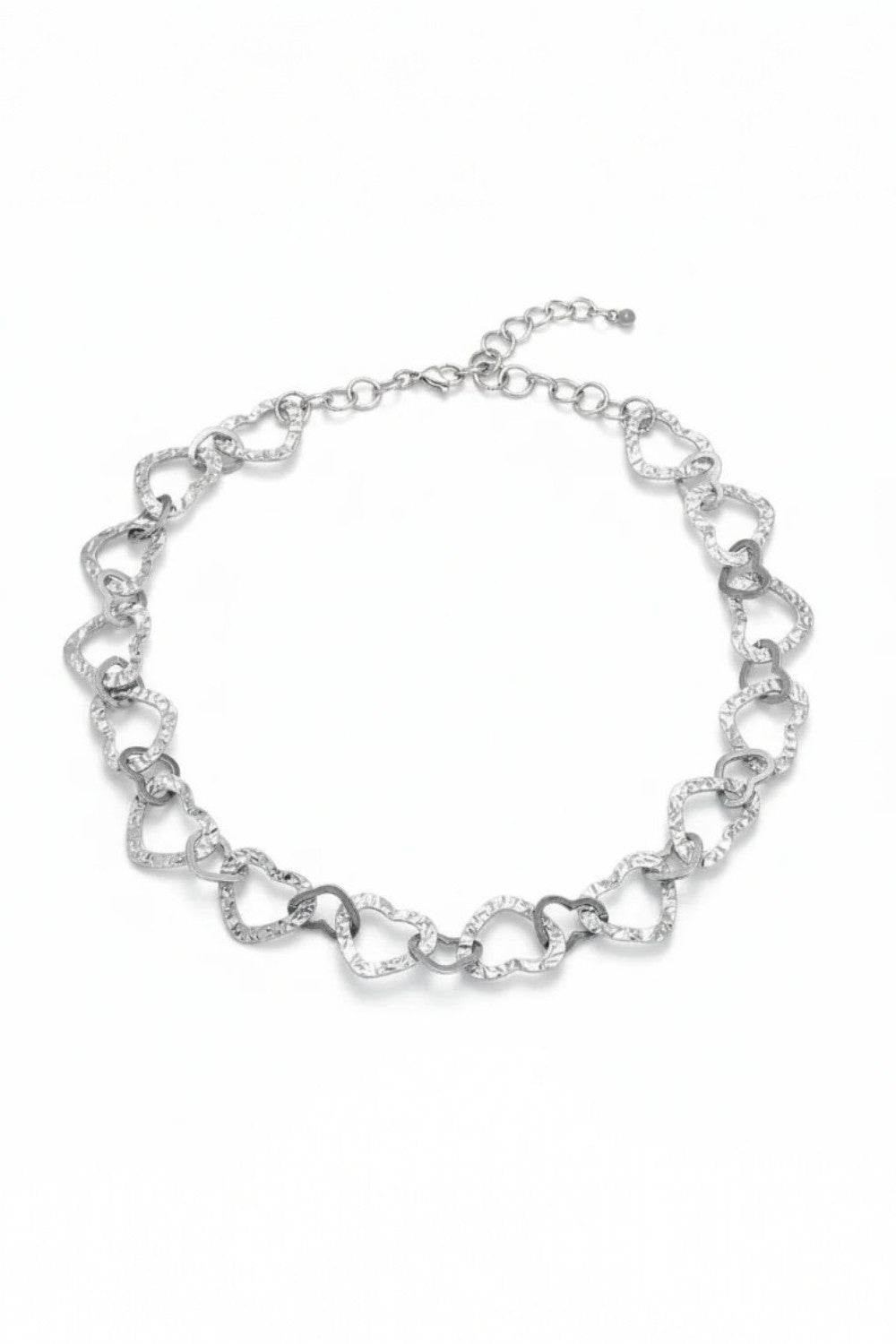 Silver chain necklace on a white background