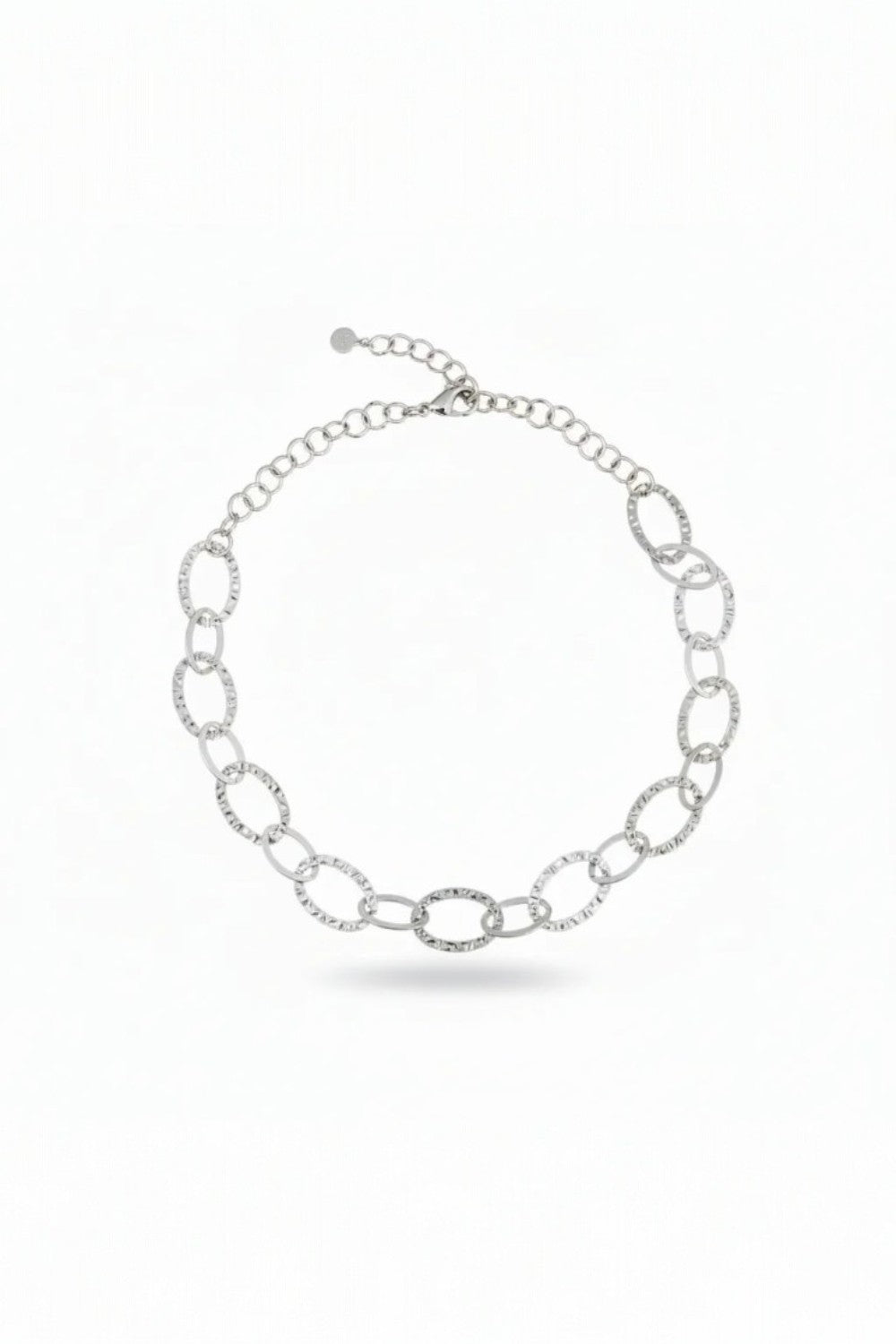 Silver chain necklace on a white background
