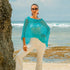 Crafted from lightweight sheer fabric, our Sheer Mesh Poncho is the perfect accessory to cover your shoulders in style. Its versatile design can be dressed up or down, making it a must-have for any wardrobe. Stay cool and chic all at once with this fashionable poncho.