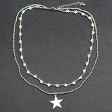 Delight in the beauty of the Suzie Blue Silver Plate Double Strand Star Charm Necklace.