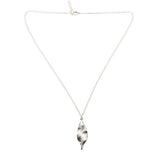 Necklace with a leaf pendant on a white background