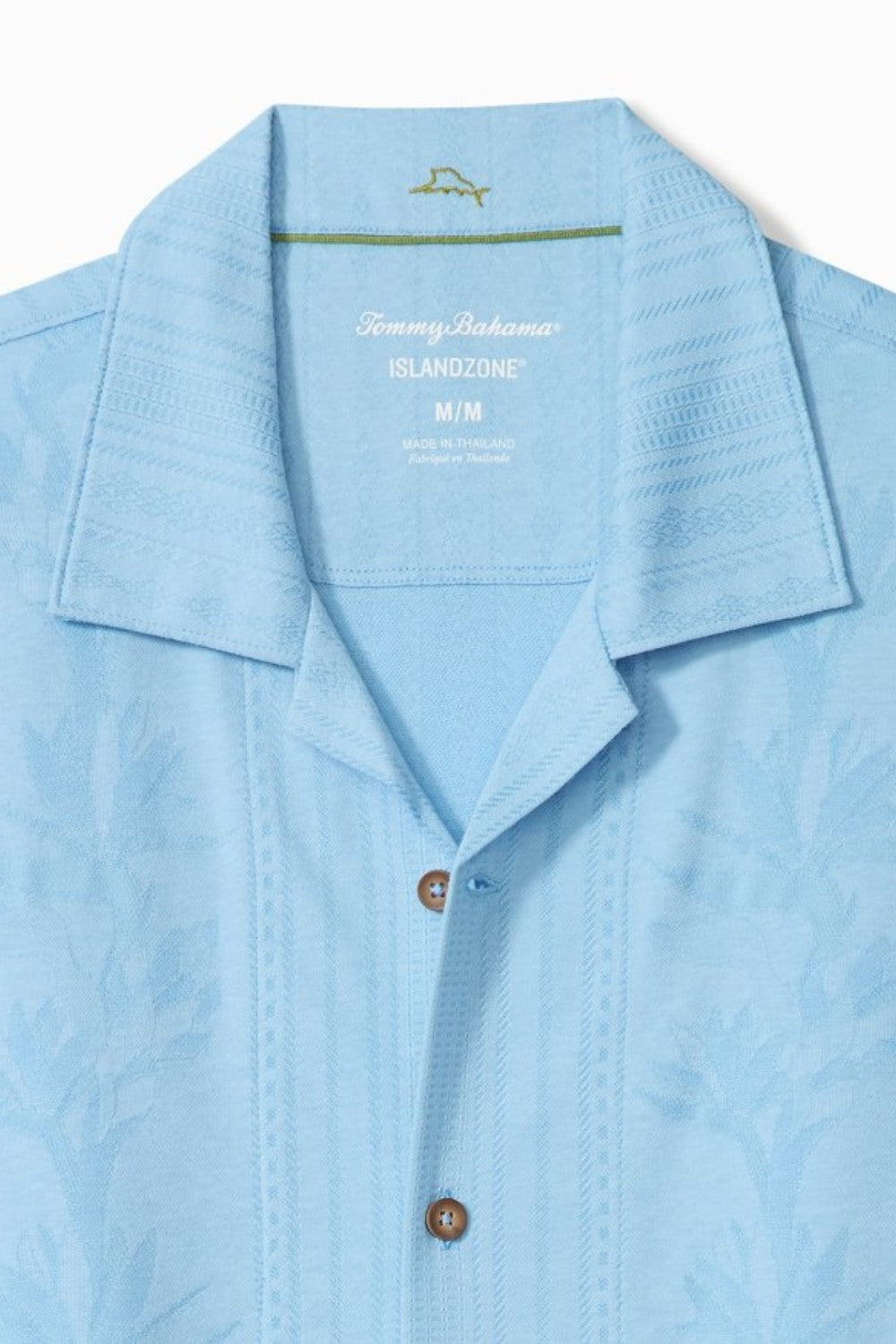 Light blue shirt with collar and brand logo on a white background