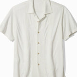 Beige short-sleeve shirt on a white background