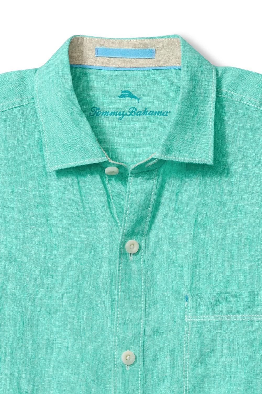 Get ready to feel the breeze in style with the Tommy Bahama Paradise Breezer! This short sleeve linen white shirt from Tommy Bahama is perfect for any occasion. Stay cool and comfortable while looking effortlessly chic. Paradise awaits!