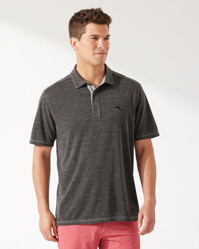 Stylish and soft to the touch—head to cocktail hour or hit the town with this polo that transports you right to an island state of mind.