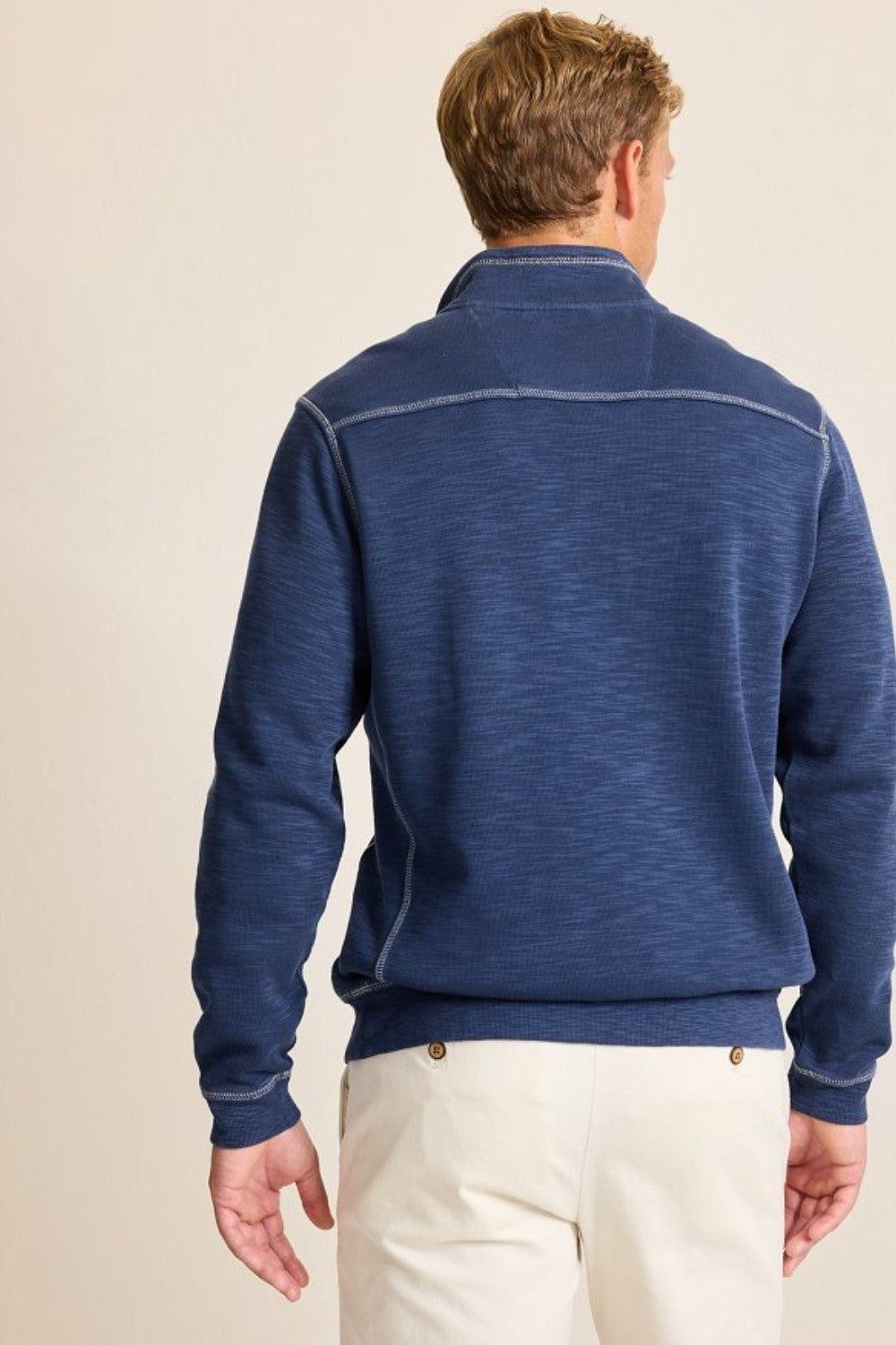 For sunset at the beach or an easy bonfire layer, look to this comfortable half-zip sweatshirt with a subtle faded wash and unique slubbed texture.