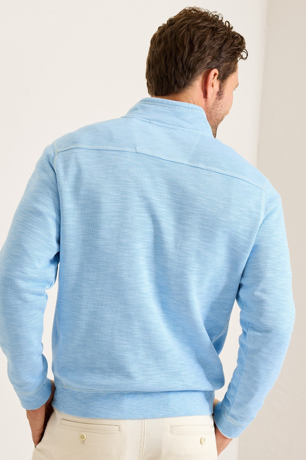 For sunset at the beach or an easy bonfire layer, look to this comfortable half-zip sweatshirt with a subtle faded wash and unique slubbed texture.