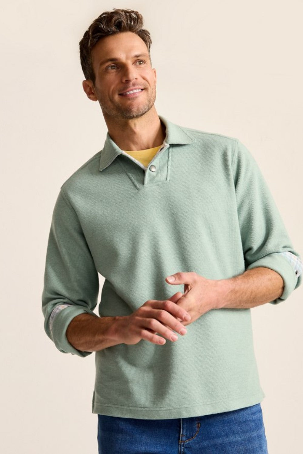 Special details like cord trim and a polished snap placket inspire a polo design like no other—one that effortlessly blends casual and sophisticated appeal. Crafted from a soft, heathered cotton blend, this style is ready for recreation&nbsp;and&nbsp;relaxation, whether you style it alone or as a layer.