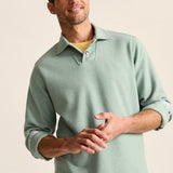 Special details like cord trim and a polished snap placket inspire a polo design like no other—one that effortlessly blends casual and sophisticated appeal. Crafted from a soft, heathered cotton blend, this style is ready for recreation&nbsp;and&nbsp;relaxation, whether you style it alone or as a layer.