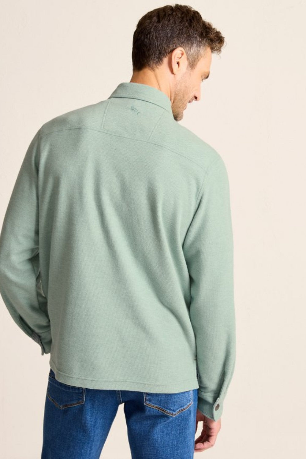 Special details like cord trim and a polished snap placket inspire a polo design like no other—one that effortlessly blends casual and sophisticated appeal. Crafted from a soft, heathered cotton blend, this style is ready for recreation&nbsp;and&nbsp;relaxation, whether you style it alone or as a layer.