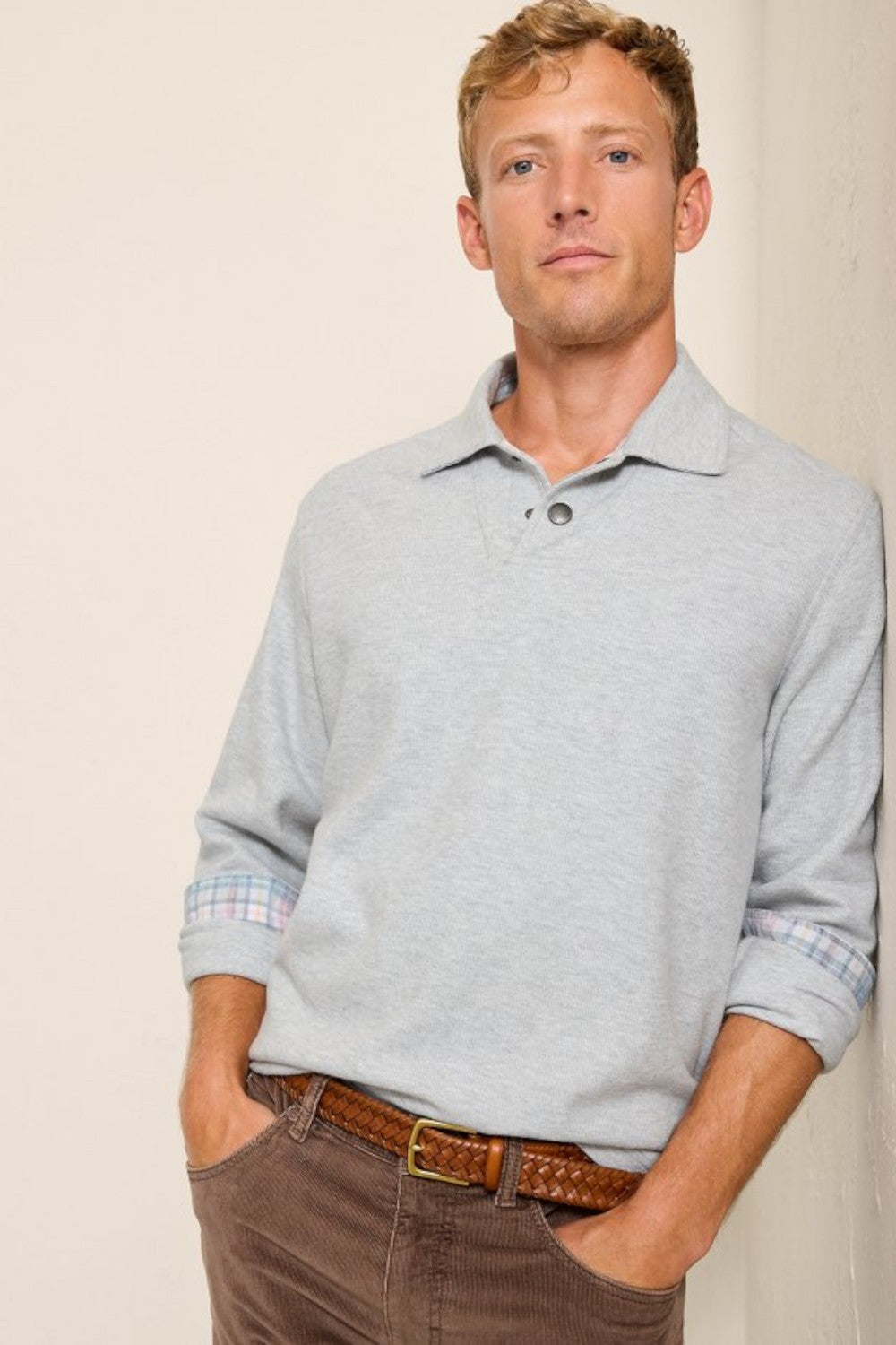 Special details like cord trim and a polished snap placket inspire a polo design like no other—one that effortlessly blends casual and sophisticated appeal. Crafted from a soft, heathered cotton blend, this style is ready for recreation&nbsp;and&nbsp;relaxation, whether you style it alone or as a layer.