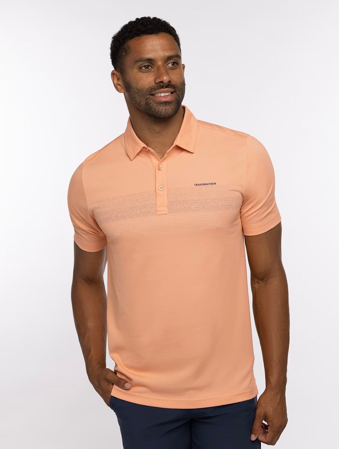 The Travis Mathew MESA CENTRAL Polo is constructed from high-quality fabric blends, which provides a stylish look while also delivering superior performance and comfort. 