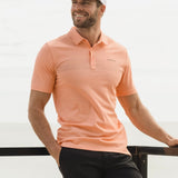 The Travis Mathew MESA CENTRAL Polo is constructed from high-quality fabric blends, which provides a stylish look while also delivering superior performance and comfort. 