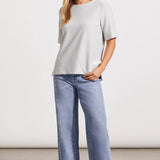 Ottoman knit fabric with a textured finish and two-way stretch delivers style-forward comfort to this top.