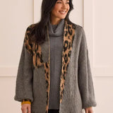 Take a walk on the wild side while keeping comfort at the forefront of your outfit with this animal print cardigan. 