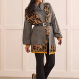 Take a walk on the wild side while keeping comfort at the forefront of your outfit with this animal print cardigan. 