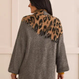 Take a walk on the wild side while keeping comfort at the forefront of your outfit with this animal print cardigan. 