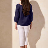 Soak up the sunshine in this breezy off-shoulder top, or transform your look by adjusting the neckline for extra coverage with its convertible design. Crafted from breathable cotton gauze with a subtle crinkle finish, this top stays wrinkle-free for easy wear. The long puff sleeves feature striking details and end in a fitted hem that can be effortlessly pushed back for a more relaxed vibe.