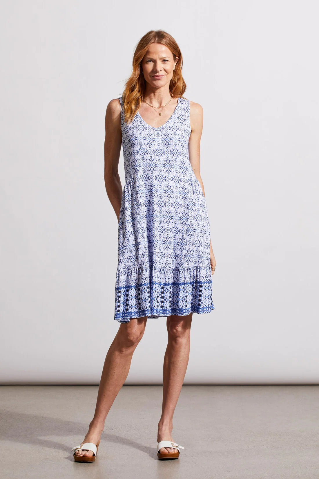 When comfort and fashion-forward style combine, they're a match made in heaven, and this flowy dress is the answer to our prayers. We're obsessed with the airy fit and sleeveless cut that flatters all day long, v-neckline, 36" length, side-seam pockets, and stretchy jersey fabric showing off a bold design. It's easy, breezy, and stylish.
