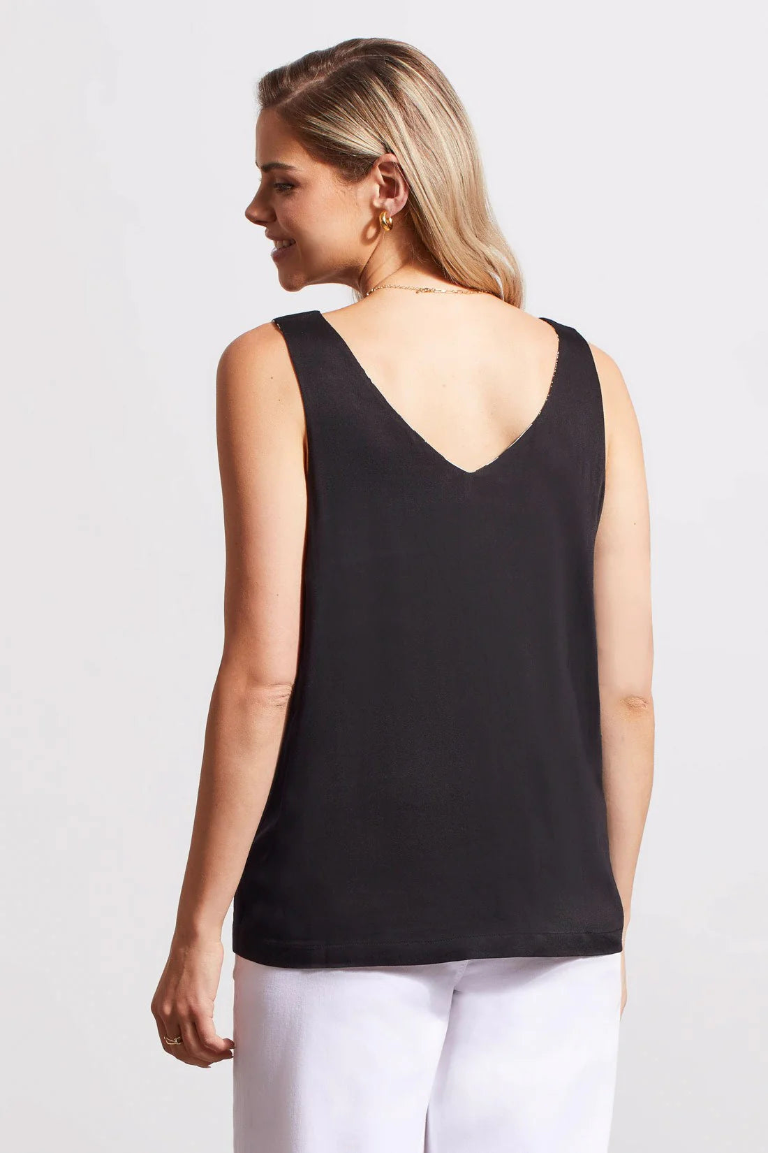 This V-neck cami is the style solution we've all been waiting for because it goes double duty as a reversible solid or print top, giving you endless options for getting dressed in the most fashionable way.