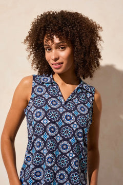 Elevate your style with this polo top featuring an eye-catching textured print. The sleeveless design keeps you cool on warmer days, while the shirttail finish offers a draped look that makes it easy to tuck in.