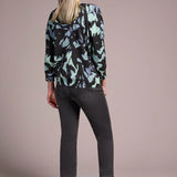 Opt for this relaxed crewneck sweater when you desire casual coziness in a soft yarn blend. The all-over floral print adds an uplifting touch to your look, while drop shoulders enhance comfort and ease of movement. Three-quarter-length sleeves provide the perfect amount of coverage.