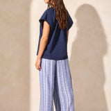 Infuse your look with effortless boho charm in this short-sleeve top, featuring a notch neckline with tassel-tipped ties. Made from soft cotton slub knit, it offers a breathable, comfortable feel. A contour band accentuates the neckline, while braided edge trim adds a refined touch to the design.