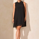 
Infuse your style with simple poise in this sleek sleeveless dress, featuring delicate detailing along the yoke. Rushing on the front and back panels creates a flattering silhouette, while an interior lining ensures comfortable coverage. Side seam pockets offer a convenient spot for your phone and other essentials.