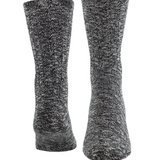 Two black mix socks, one showing from the toe and the other from the heel, photographed on a light background.