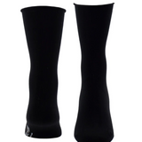 Two black socks, one showing from the toe and the other from the heel, photographed on a light background.