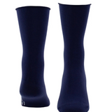 Two navy socks, one showing from the toe and the other from the heel, photographed on a light background.