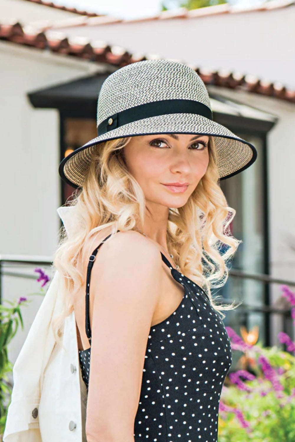 Rediscover timeless style with the Darby cloche sun hat, a contemporary twist on a vintage classic. Designed with clean lines and neutral tones, this hat brings effortless elegance to any look, making it the perfect accessory for everything from stylish shopping outings to relaxed beachside walks.