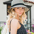 Rediscover timeless style with the Darby cloche sun hat, a contemporary twist on a vintage classic. Designed with clean lines and neutral tones, this hat brings effortless elegance to any look, making it the perfect accessory for everything from stylish shopping outings to relaxed beachside walks.