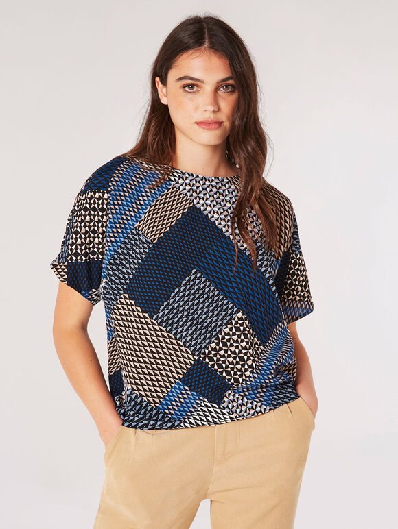 Tap into statement style with this patchwork print T-shirt. Crafted from a woven, textured fabric to an oversized fit, this lightweight tee features short sleeves, a crew neckline, and a dipped hem. Team yours with slim-fit jeans for relaxed, off-duty outfitting.