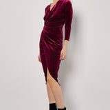 Perfect for any special occasion, this Apricot Glitter Velvet Side Ruched Midi Dress is sure to make a statement. With a flattering v-neckline and elegant faux wrap design, this dress is the perfect combination of glamour and sophistication. Feel confident and stylish at your next event with this stunning dress.