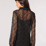 This unique Apricot Geometric Guipure Lace Shirt is sure to turn heads! Featuring an intricate geometric pattern, the luxurious lace is classic black for a timeless look. 