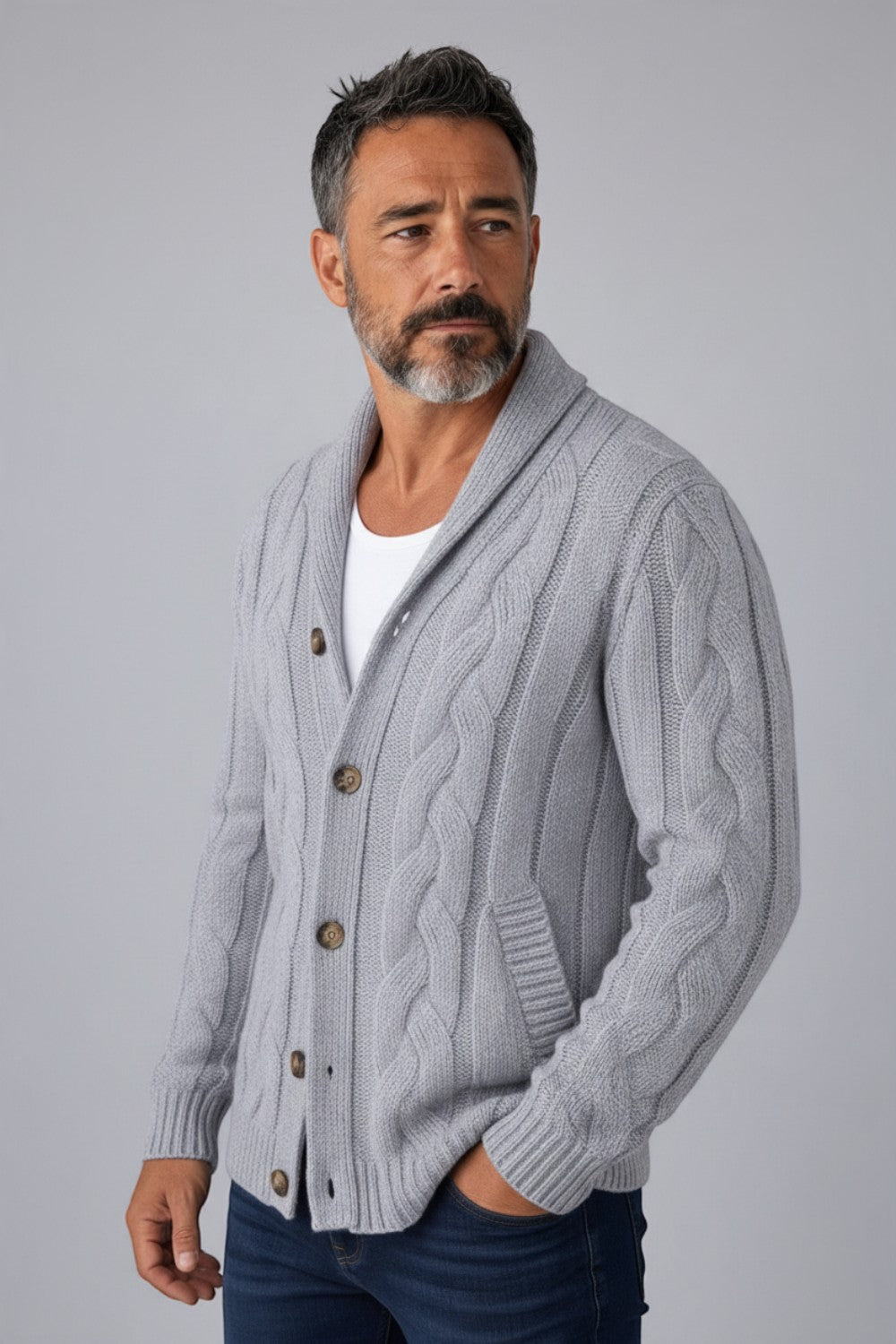 Broderick's Clothing Co. grey cable-knit wool blend cardigan with shawl collar and buttons worn by a bearded man